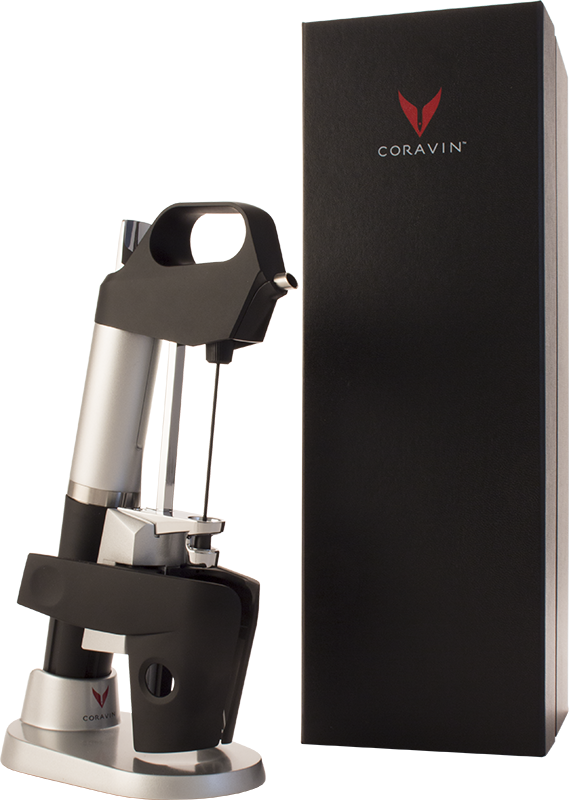 Coravin Model One system standing beside its matte black retail carton with capsules